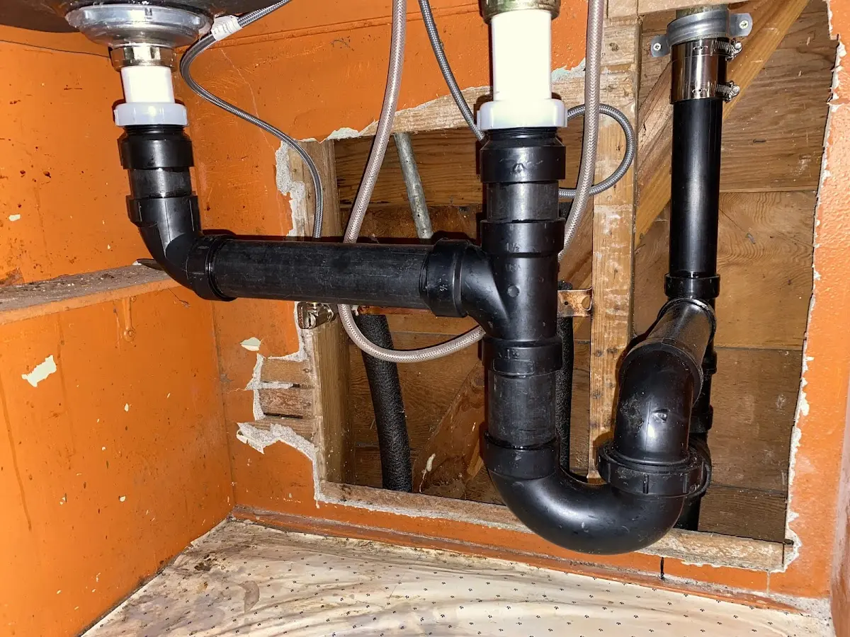 Professional Garbage Disposal Repair equipment and tools on the job in East Drumore